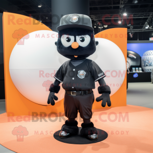 Black Human Cannon Ball mascot costume character dressed with a Baseball Tee and Hats