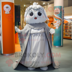 Silver Apricot mascot costume character dressed with a Maxi Skirt and Shawls