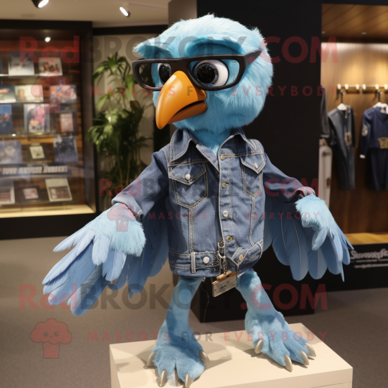 Sky Blue Archeopteryx mascot costume character dressed with a Denim Shirt and Keychains Sky Blue Archeopteryx mascot costume character dressed with a Denim Shirt and Keychains
