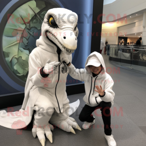 White Utahraptor mascot costume character dressed with a Hoodie and Watches