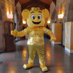 Gold Irish Castle mascot costume character dressed with a Yoga Pants and Bow ties