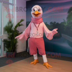 Pink Seagull mascot costume character dressed with a Joggers and Ties