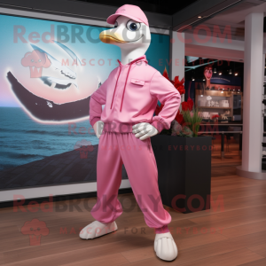 Pink Seagull mascot costume character dressed with a Joggers and Ties