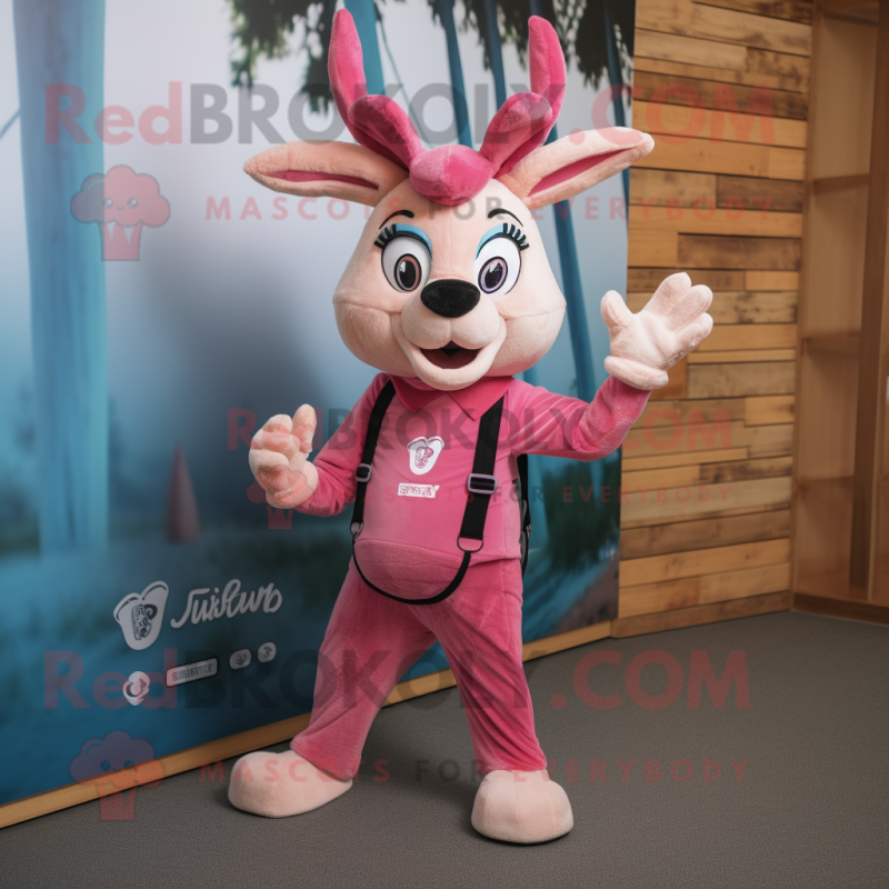 Pink Gazelle mascot costume character dressed with a Dungarees and Beanies Pink Gazelle mascot costume character dressed with a Dungarees and Beanies