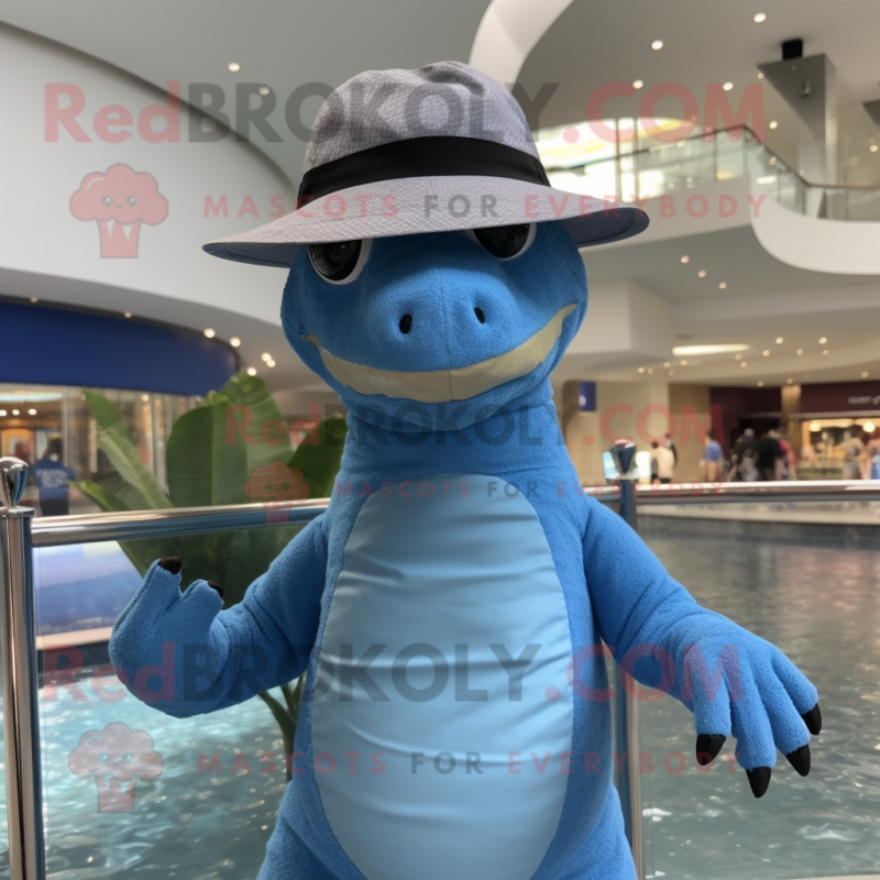 Blue Komodo Dragon mascot costume character dressed with a Swimwear and Hats