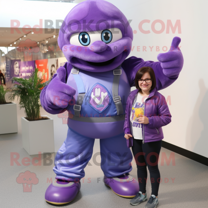 Purple Commando mascot costume character dressed with a Mom Jeans and Brooches Purple Commando mascot costume character dressed with a Mom Jeans and Brooches