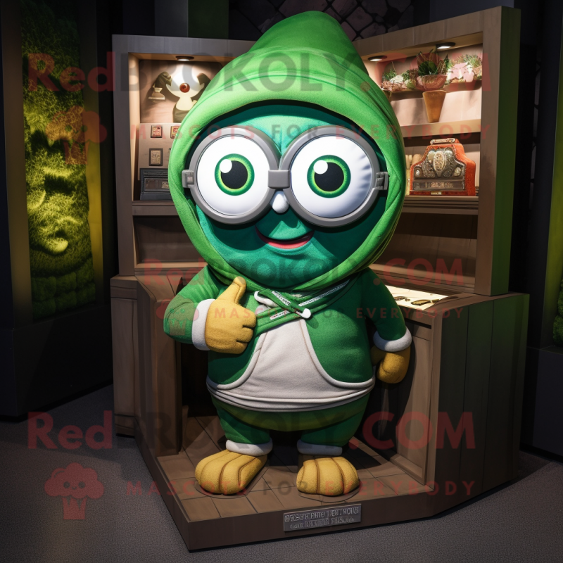 Green Treasure Chest mascot costume character dressed with a Hoodie and Eyeglasses