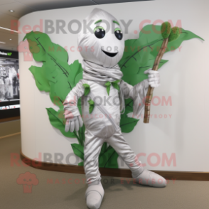Silver Beanstalk mascot costume character dressed with a Leggings and Scarf clips