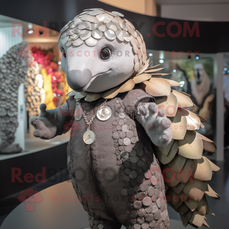 Gray Pangolin mascot costume character dressed with a Playsuit and Brooches