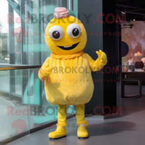 Yellow Cupcake mascot costume character dressed with a Turtleneck and Bracelet watches