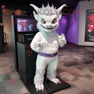 White Gargoyle mascot costume character dressed with a Leggings and Hair clips