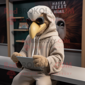 Beige Haast'S Eagle mascot costume character dressed with a Hoodie and Reading glasses