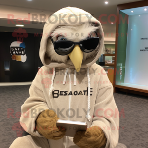 Beige Haast'S Eagle mascot costume character dressed with a Hoodie and Reading glasses