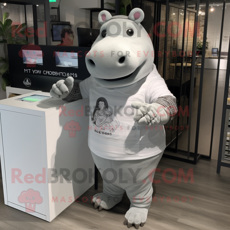 Silver Hippopotamus mascot costume character dressed with a Pencil Skirt and Smartwatches Silver Hippopotamus mascot costume character dressed with a Pencil Skirt and Smartwatches