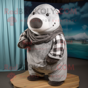 Silver Stellar'S Sea Cow mascot costume character dressed with a Flannel Shirt and Cummerbunds