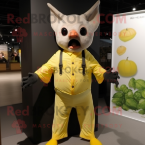 Lemon Yellow Fruit Bat mascot costume character dressed with a Trousers and Suspenders