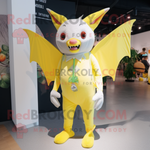 Lemon Yellow Fruit Bat mascot costume character dressed with a Trousers and Suspenders