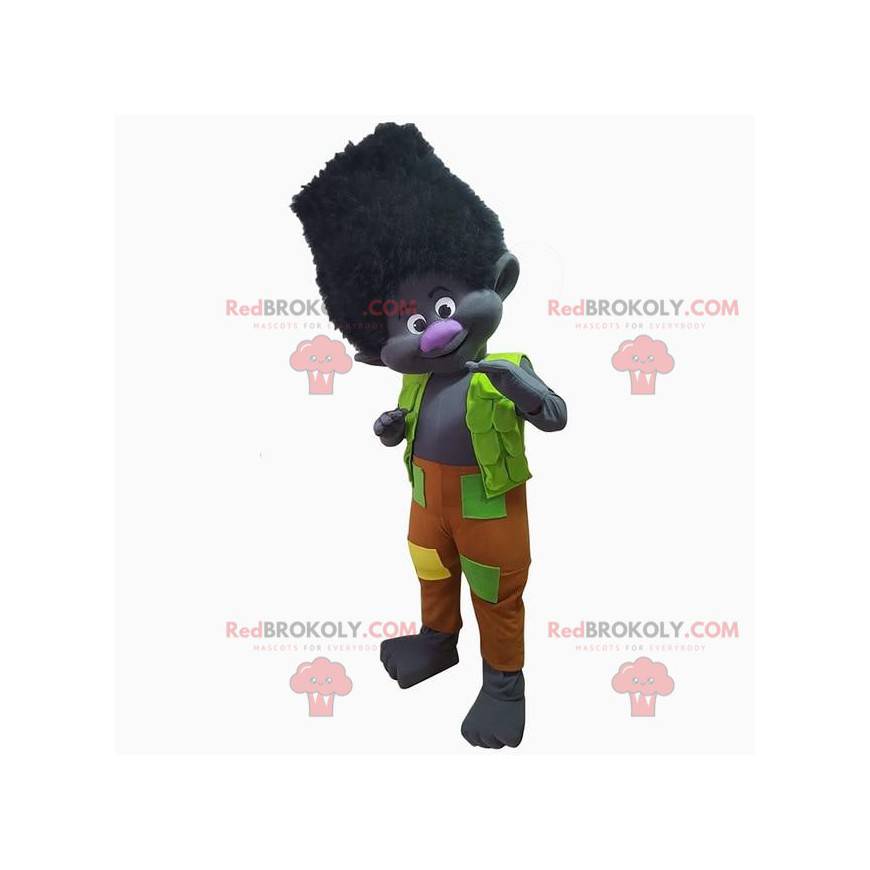 Mascotte de troll noir vêtu d'une tenue colorée, créature noire