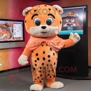 Peach Jaguar mascot costume character dressed with a Jumpsuit and Shawl pins