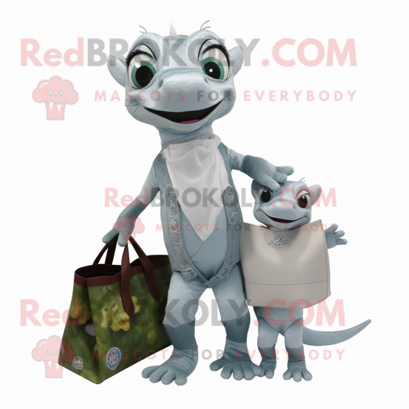 Silver Geckos mascot costume character dressed with a Mom Jeans and Tote bags Silver Geckos mascot costume character dressed with a Mom Jeans and Tote bags