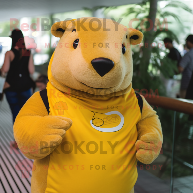 Yellow Capybara mascot costume character dressed with a T-Shirt and Wraps Yellow Capybara mascot costume character dressed with a T-Shirt and Wraps