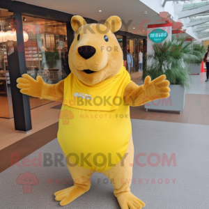 Yellow Capybara mascot costume character dressed with a T-Shirt and Wraps