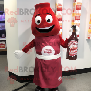 Maroon Bottle Of Ketchup mascot costume character dressed with a Polo Shirt and Lapel pins