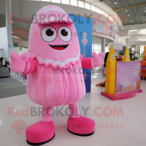 Pink Candy mascot costume character dressed with a Overalls and Clutch bags