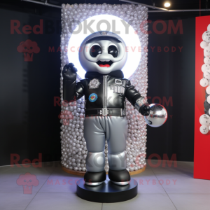 Silver Gumball Machine mascot costume character dressed with a Biker Jacket and Rings