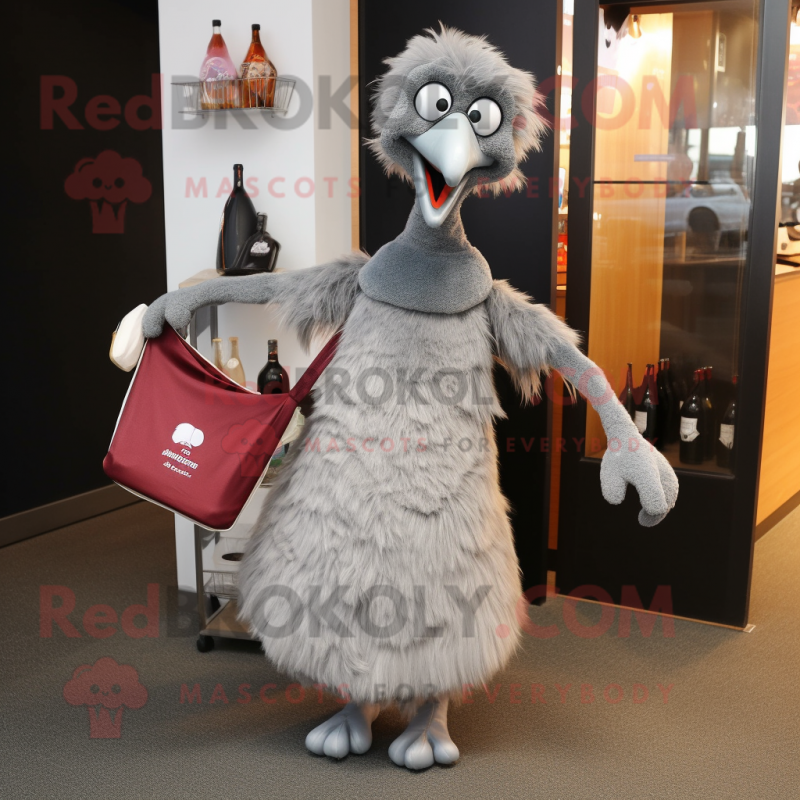 Silver Emu mascot costume character dressed with a Cocktail Dress and Tote bags