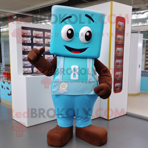 Turquoise Chocolate Bar mascot costume character dressed with a Overalls and Brooches