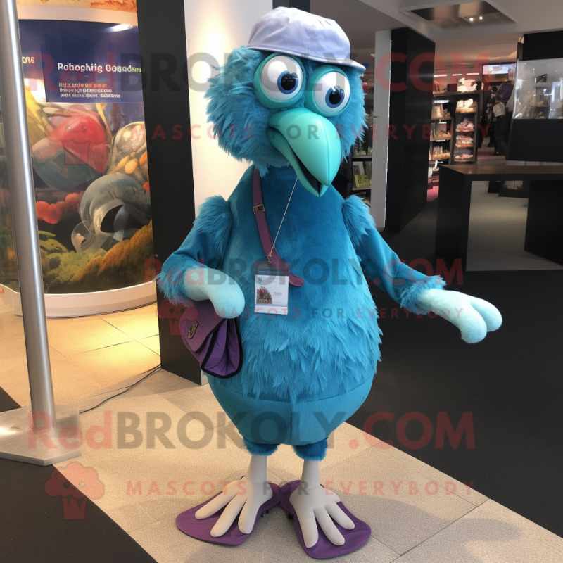 Teal Guinea Fowl mascot costume character dressed with a Jeggings and Keychains