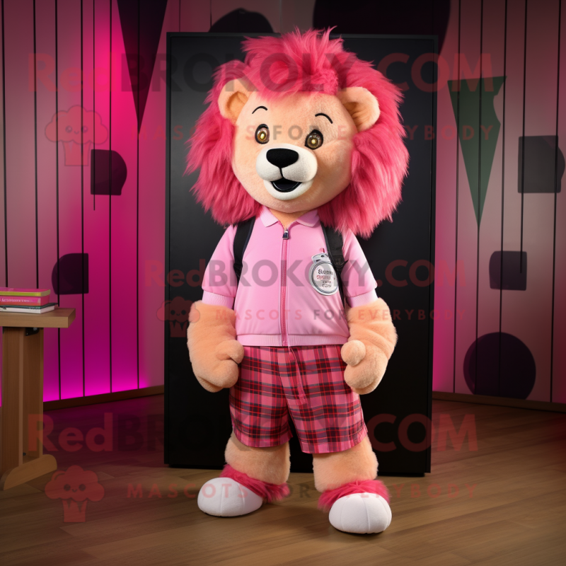 Pink Tamer Lion mascot costume character dressed with a Flannel Shirt and Lapel pins