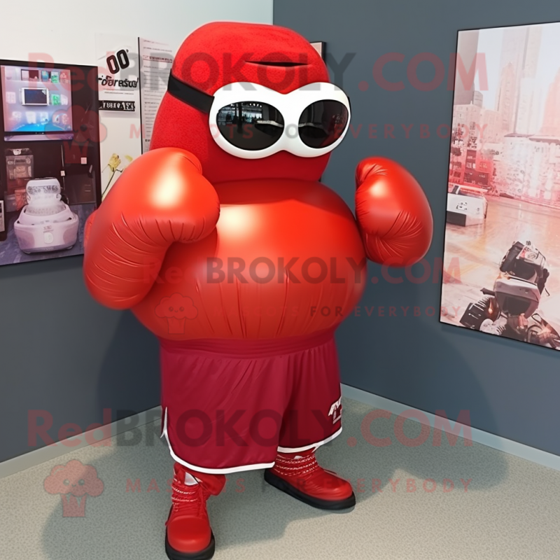 Red Boxing Glove mascot costume character dressed with a Skirt and Sunglasses Red Boxing Glove mascot costume character dressed with a Skirt and Sunglasses