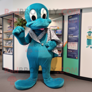 Teal Python mascot costume character dressed with a Cardigan and Shoe clips