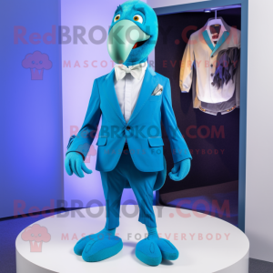 Cyan Dodo Bird mascot costume character dressed with a Suit Pants and Rings