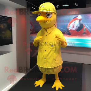 Yellow Pigeon mascot costume character dressed with a Long Sleeve Tee and Caps