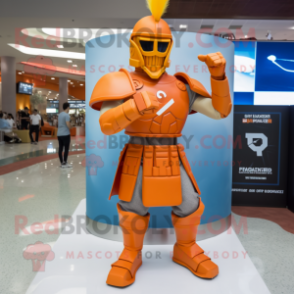Orange Spartan Soldier mascot costume character dressed with a Pencil Skirt and Bracelet watches