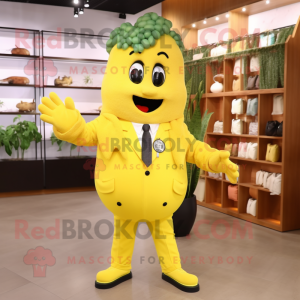 Yellow Grape mascot costume character dressed with a Suit Jacket and Tote bags