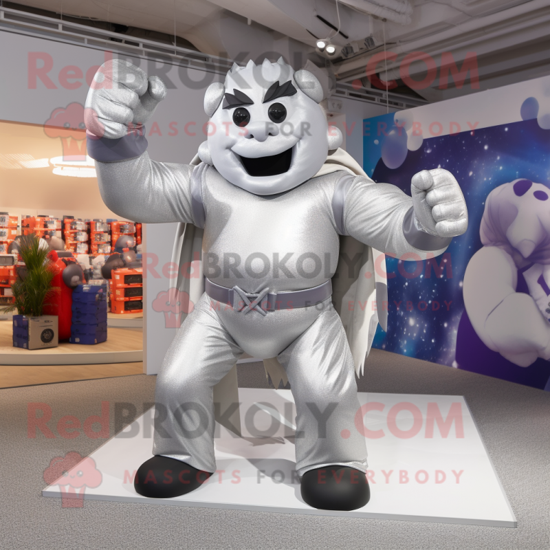 Silver Strongman mascot costume character dressed with a Maxi Dress and Mittens Silver Strongman mascot costume character dressed with a Maxi Dress and Mittens