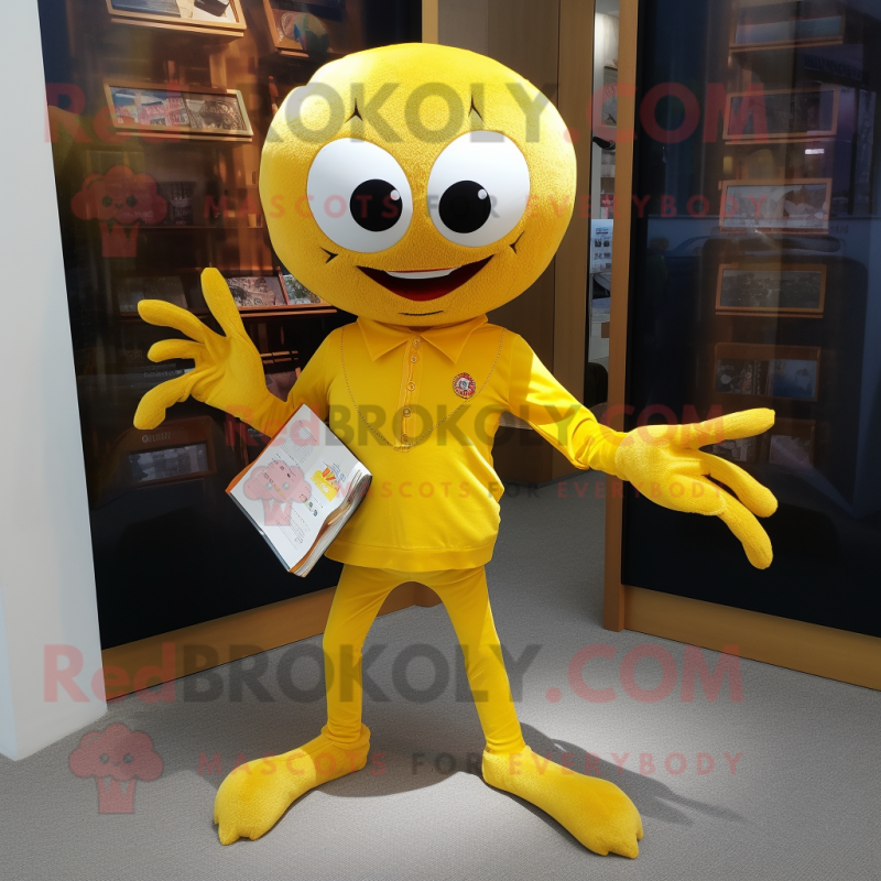 Yellow Spider mascot costume character dressed with a Oxford Shirt and Clutch bags