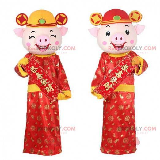 2 Schweinemaskottchen in asiatischen Outfits, asiatische