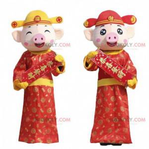 2 mascotes porcos em trajes asiáticos, mascotes asiáticos -