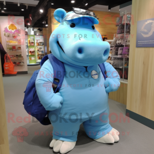 Blue Hippopotamus mascot costume character dressed with a Polo Shirt and Backpacks