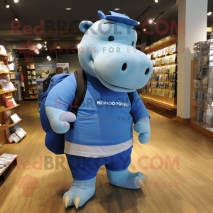 Blue Hippopotamus mascot costume character dressed with a Polo Shirt and Backpacks