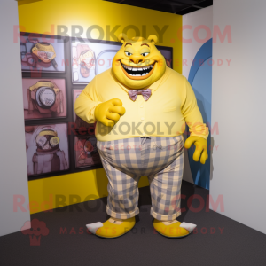 Yellow Ogre mascot costume character dressed with a Button-Up Shirt and Pocket squares