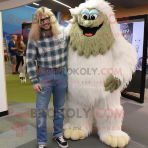 Olive Yeti mascot costume character dressed with a Boyfriend Jeans and Watches