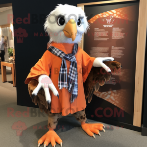 Orange Haast'S Eagle mascot costume character dressed with a Oxford Shirt and Shawl pins