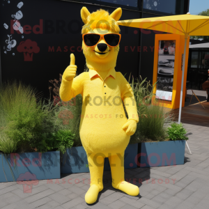 Yellow Llama mascot costume character dressed with a Dress Pants and Sunglasses