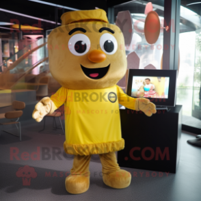 Gold Moussaka mascot costume character dressed with a Romper and Headbands